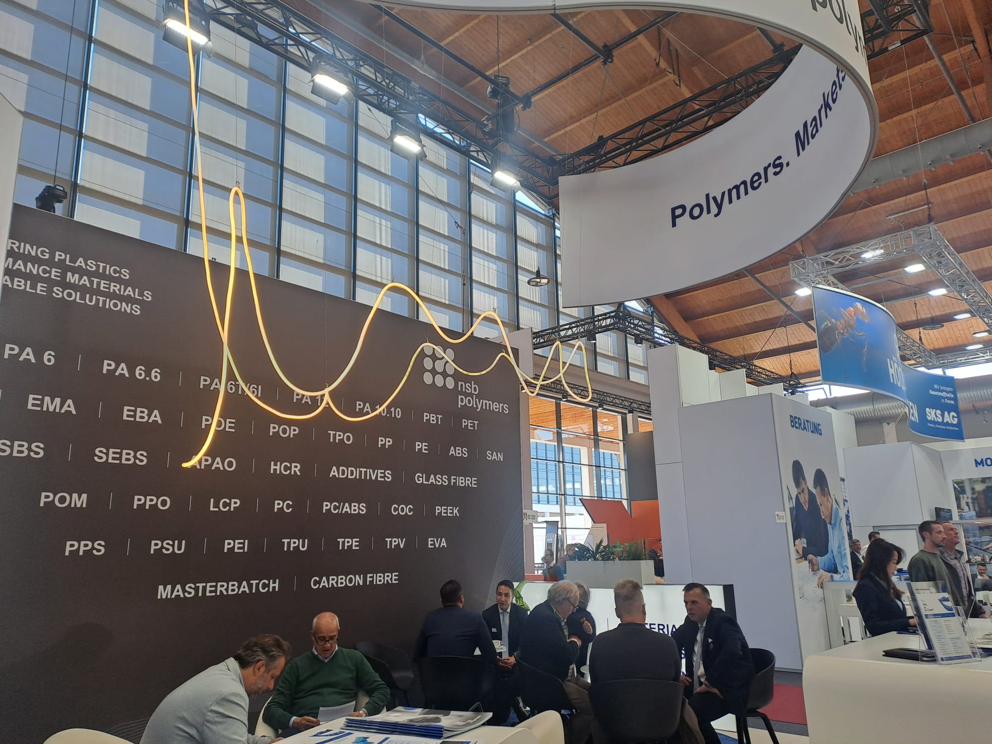 A business conversation at the NSB Polymers stand, FAKUMA 2026