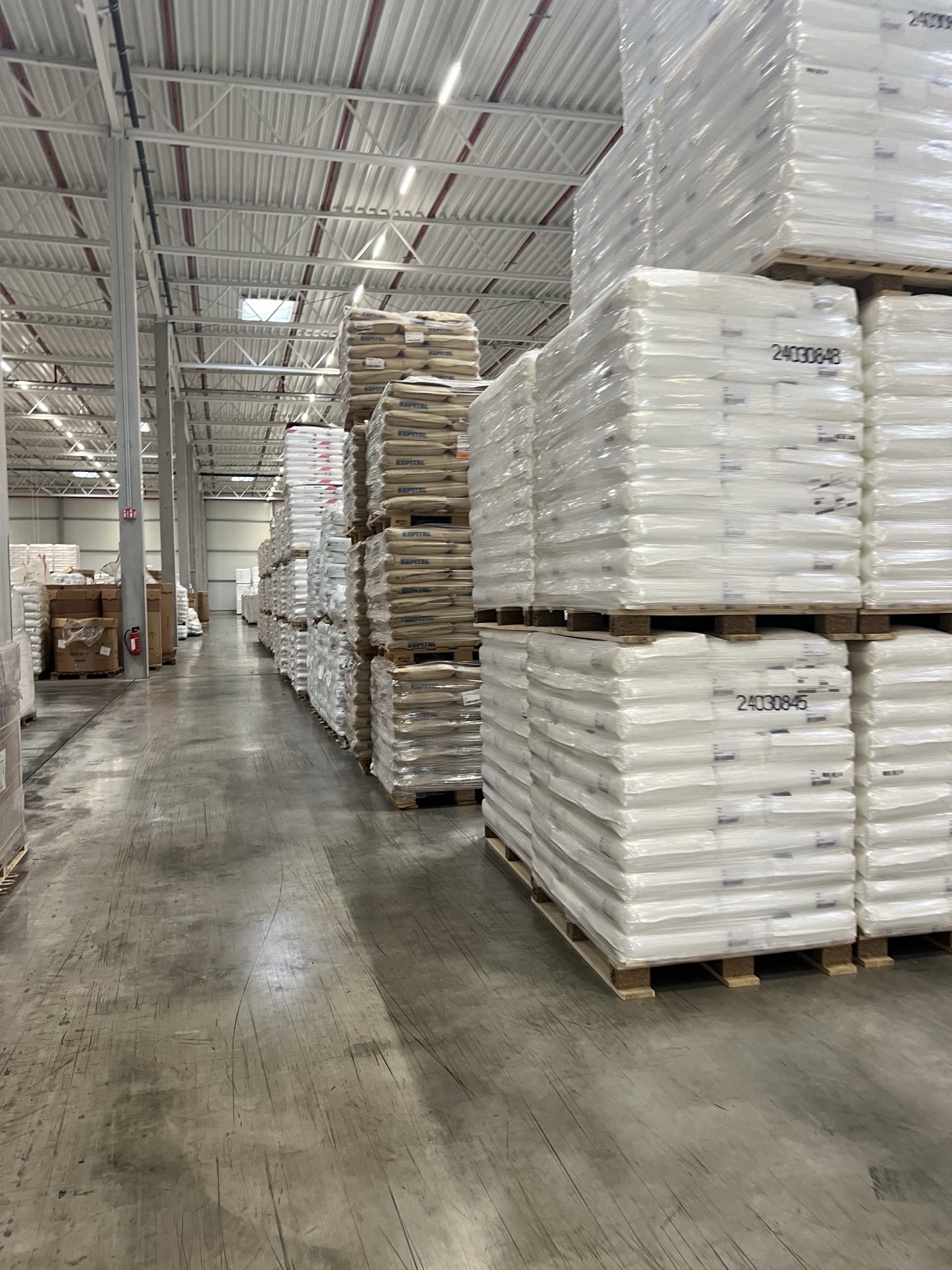 Inside the NSB Polymers warehouse in Dormagen — technical polymer stocklots on pallets